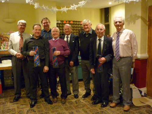 Choir members who received ties and certificates to commemorate over thirty and forty years singing in the Choir