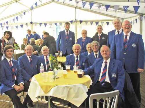 Relaxing after singing in the Shearing Marquee